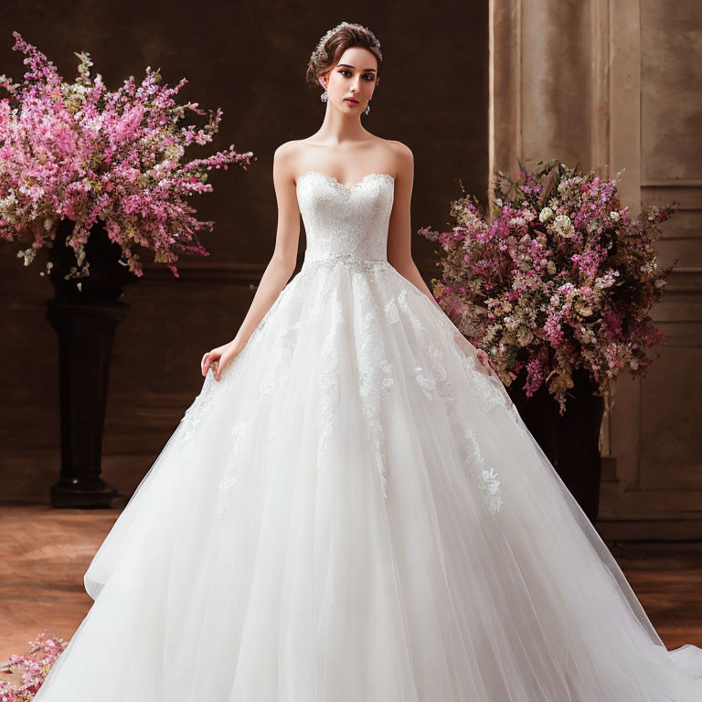 Elegant woman in white lace wedding gown with floral backdrop