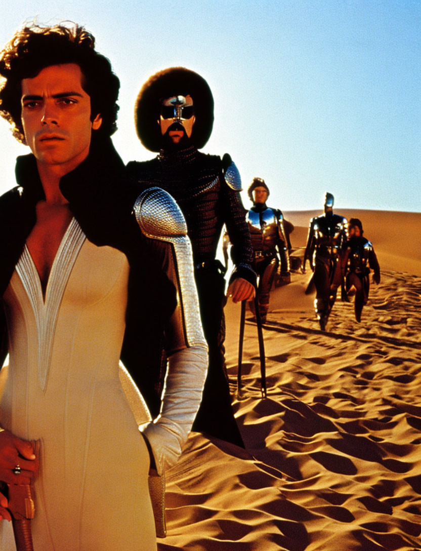 Futuristic characters in unique costumes on desert dune under bright sky