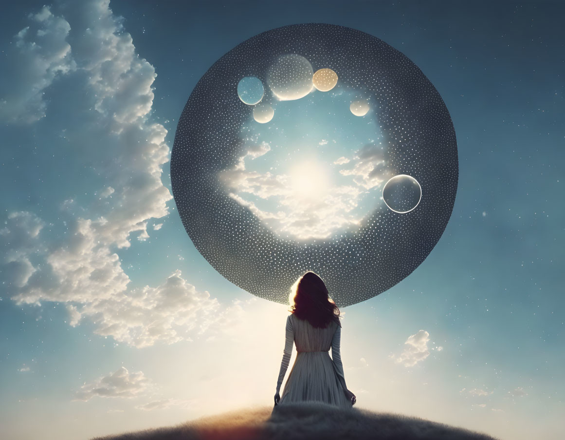 Woman in white dress gazes at surreal giant moon on grassy hill