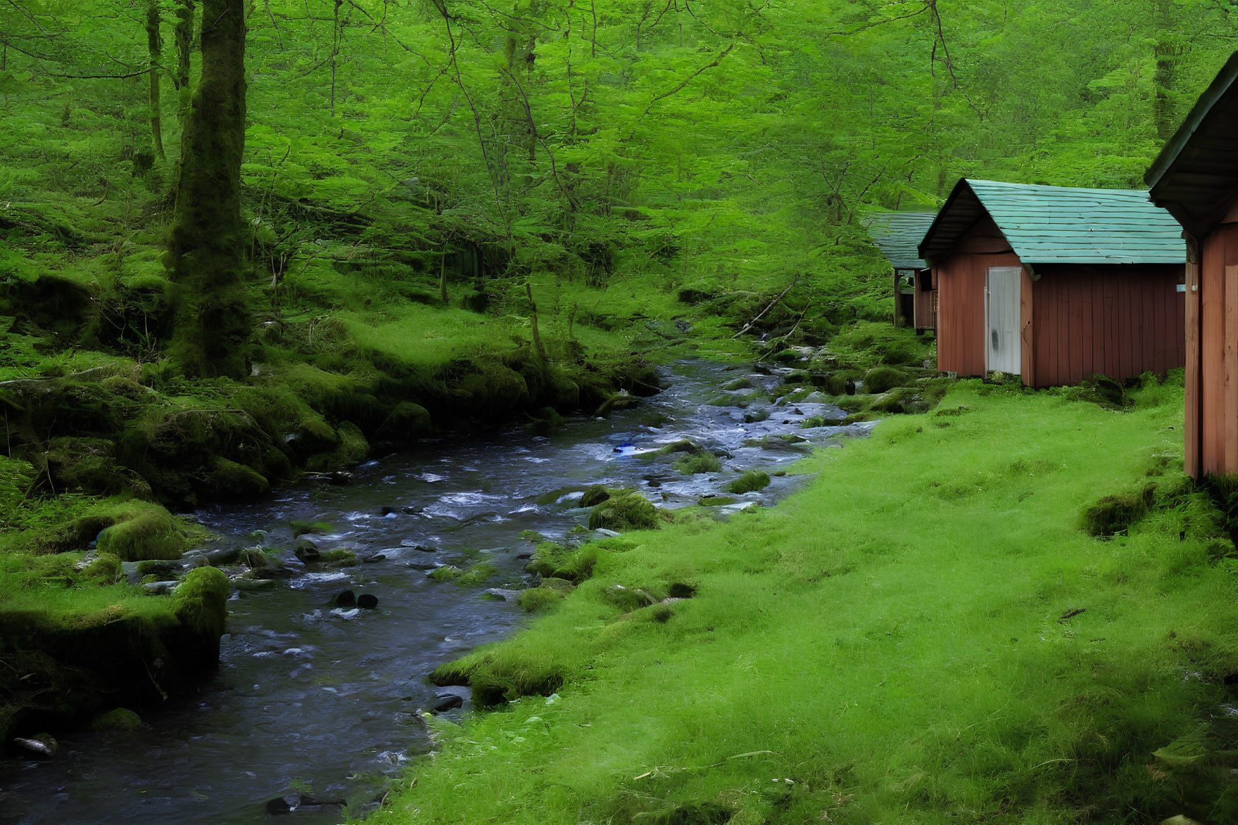 Tranquil forest scene with green canopy, stream, moss-covered rocks, and wooden cabin.