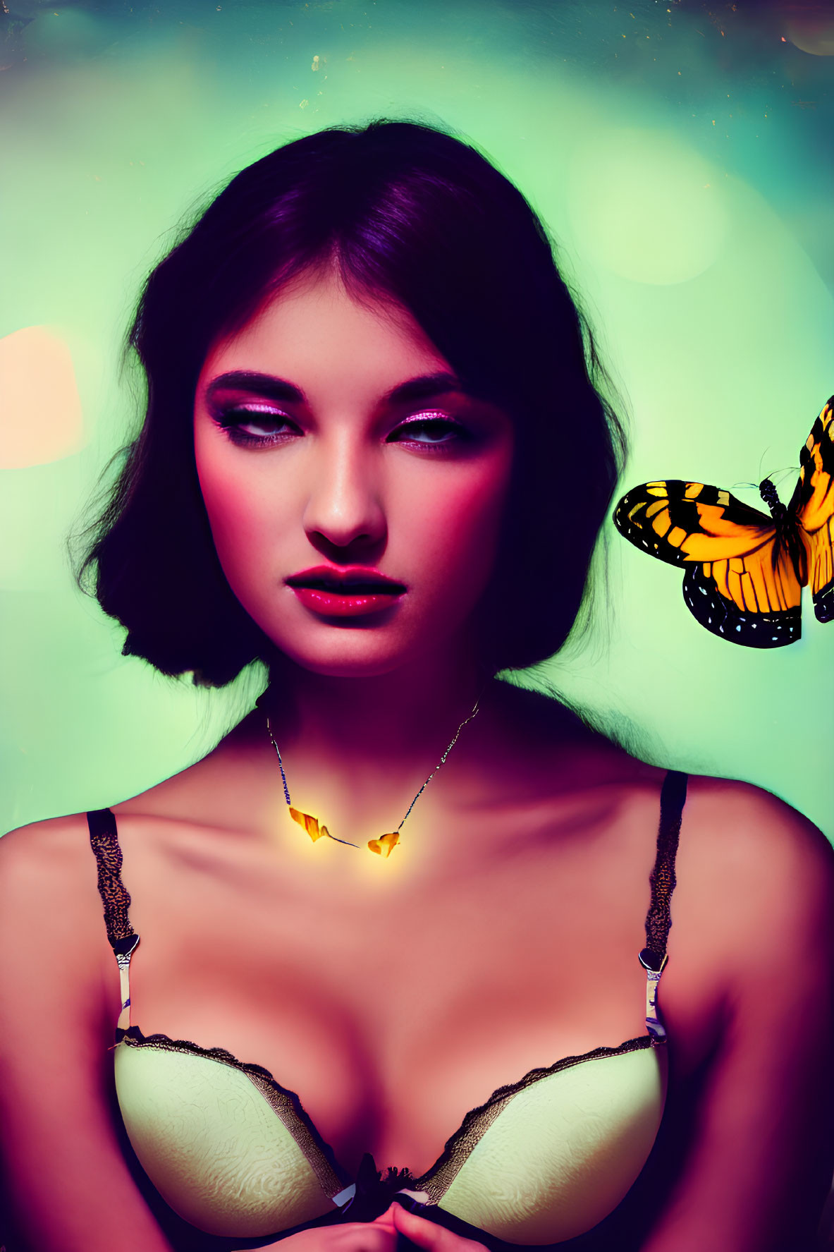 Dark-haired woman in cream bra and butterfly necklace, adorned with butterfly, on teal background with bokeh