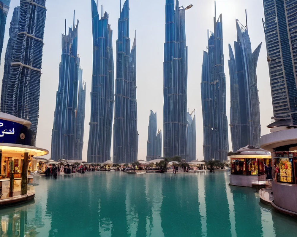 Bustling waterfront promenade with skyscrapers under hazy sky