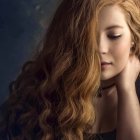 Young girl with curly hair and butterflies on dark background