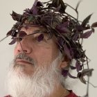 Colorful Psychedelic Elderly Man with Decorative Hat and Beard