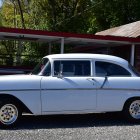 Vintage White Car with Gold Accents by Lavish Tent