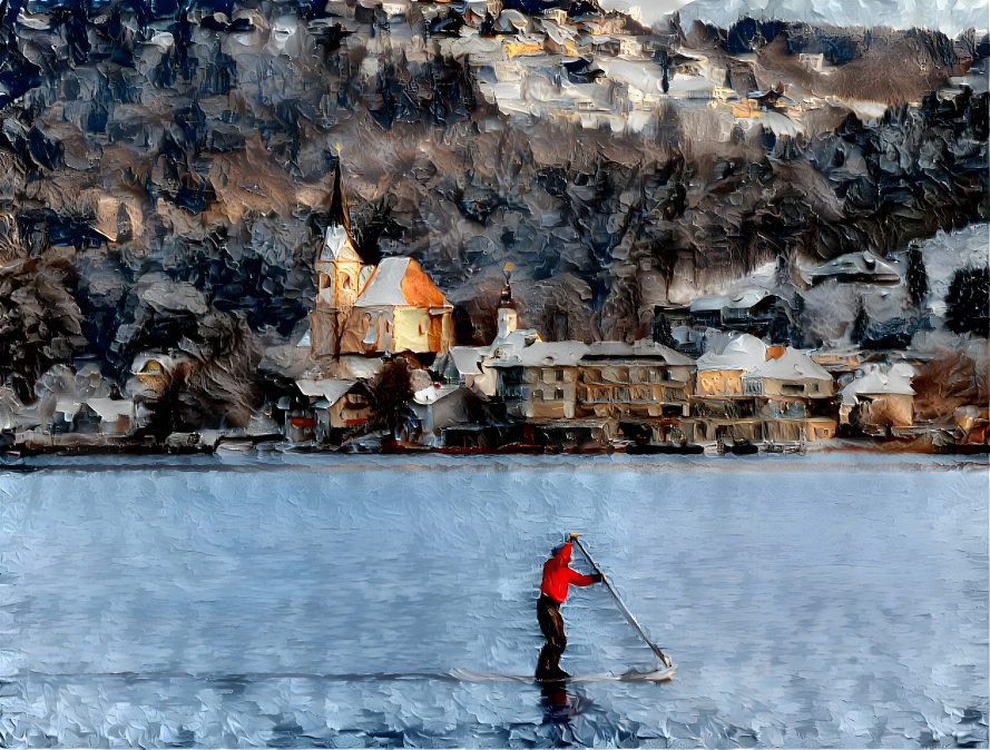 Dangerous stand up paddling on the icy lake. 