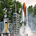 Victorian-themed illustration of rocket launch near forest