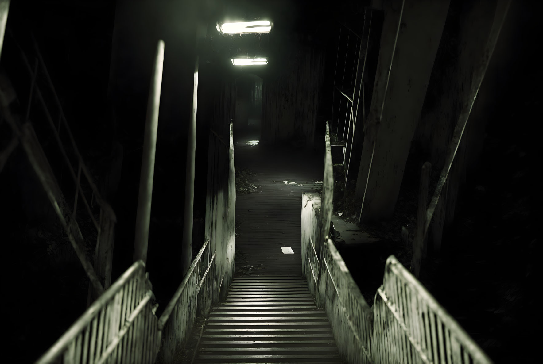 Dimly Lit Stairway and Ominous Hallway with Flickering Lights