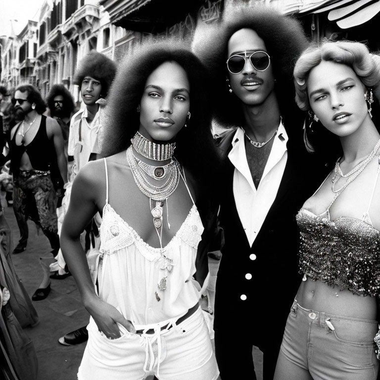 Stylish individuals with afros in 70s fashion on busy street