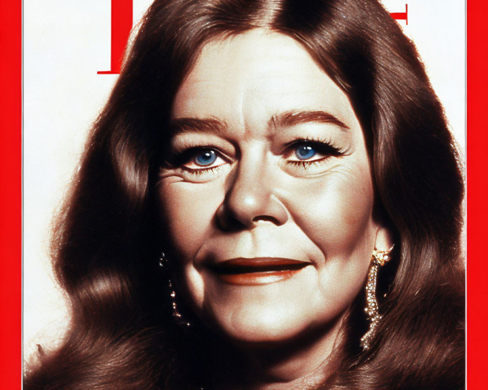 Smiling woman with blue eyes and makeup on magazine cover