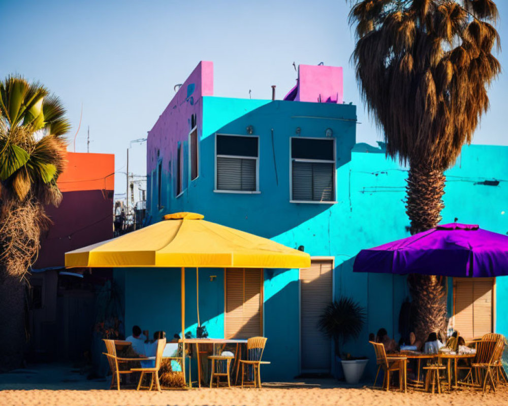 Vibrant Beachfront Scene with Colorful Buildings and Umbrellas