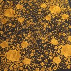 Detailed Gold and Brown Floral Pattern on Dark Background