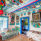 Colorful Room with Floral Wallpaper and Open Coloring Books