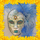 Colorful Feathered Masquerade Mask on Bright Yellow Background