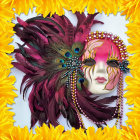 Colorful digital artwork: Woman with golden mask and feathered border