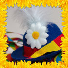 Colorful Festive Sombrero with Yellow Flowers and Glittering Background