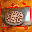 Colorful heart with roses, candles, and swirls on golden backdrop