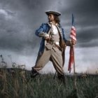 Historical American military figure with flag in stormy field