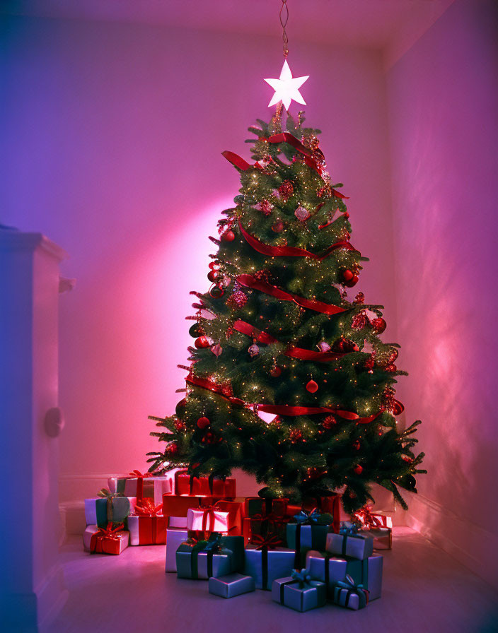 Festive Christmas tree with star topper and gifts in pink-lit room