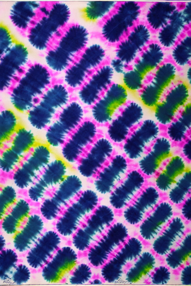 Colorful Tie-Dye Fabric with Blue, Pink, and Green Circles on Yellow