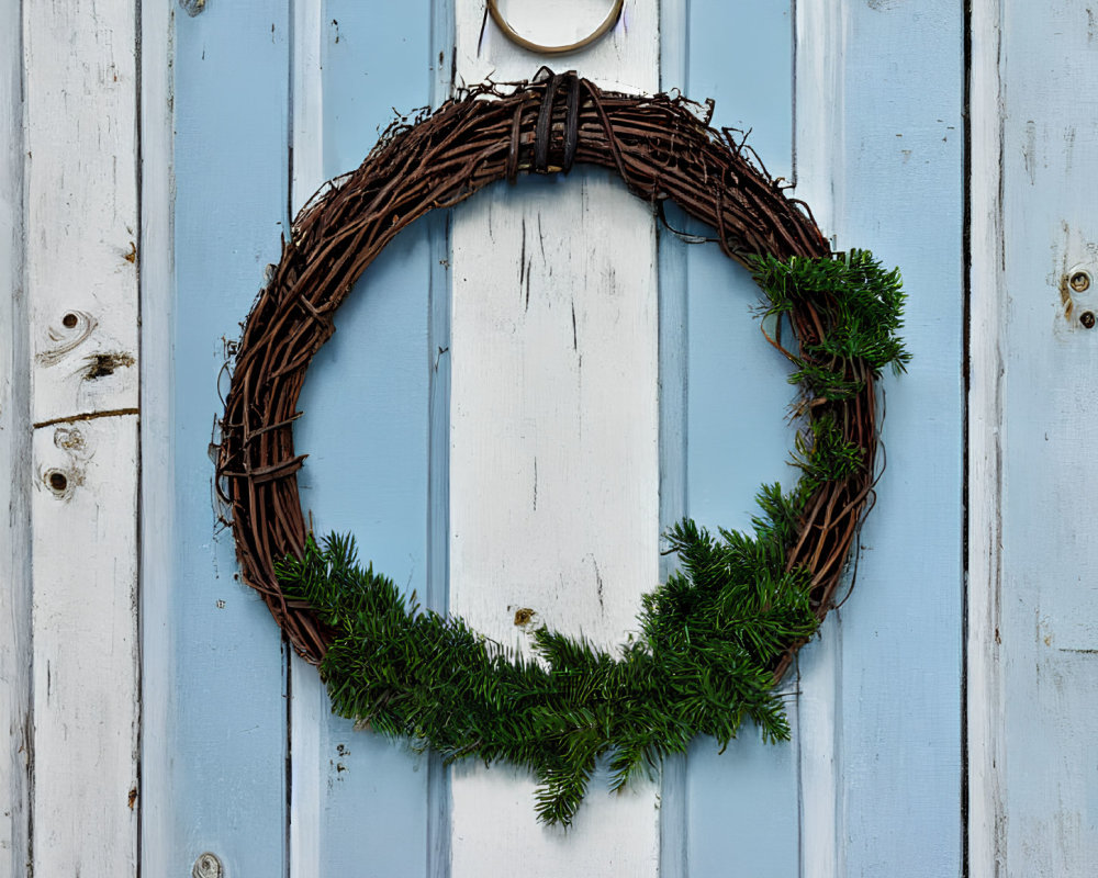 Rustic Twig Wreath with Green Foliage on Blue Wooden Door