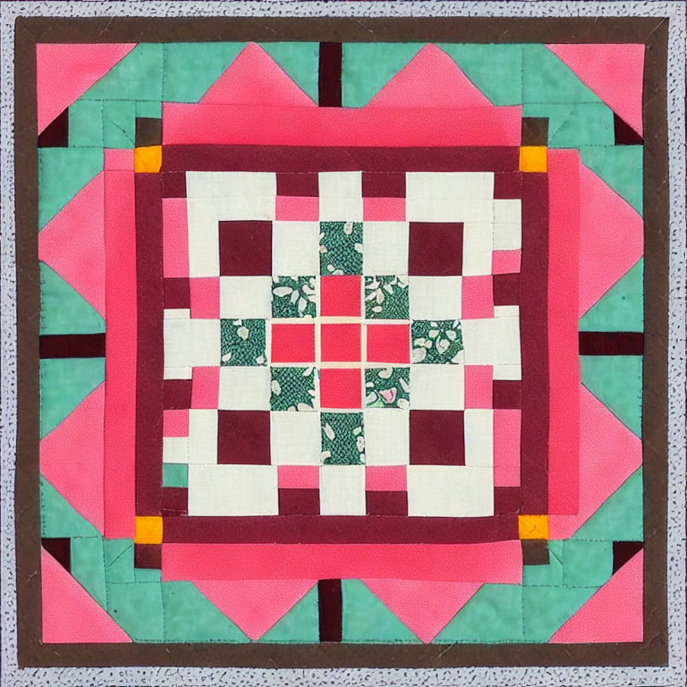 Geometric pink, green, white, and yellow quilt square design