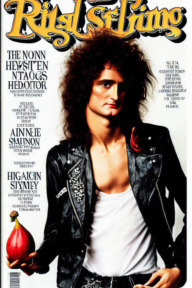 Curly-haired person in leather jacket holds red pepper on "Rolling Stone" cover