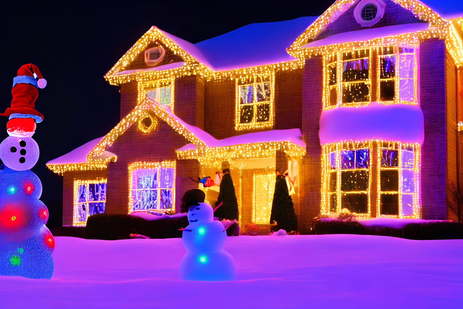 Festive Christmas house with bright lights and snow decorations