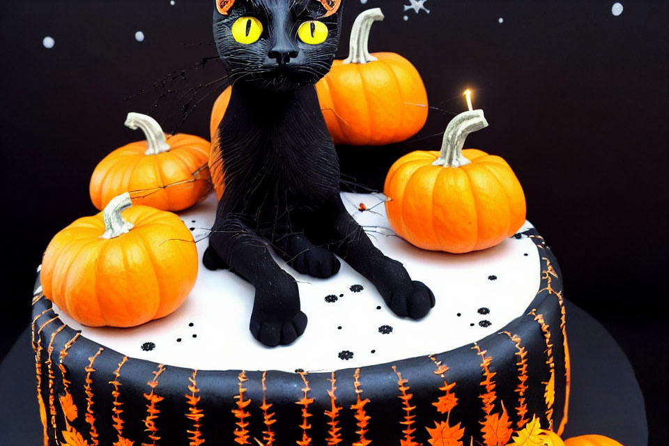 Black Cat Figurine on Halloween Cake with Pumpkins and Paw Prints