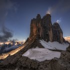 Fantasy temple complex on pine-covered cliffs