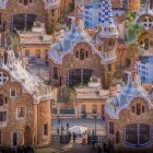 Panoramic view of intricate mosaics and unique designs at Park Güell