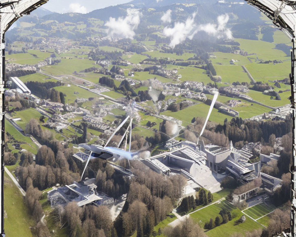 Countryside landscape with buildings, roads, trees, and river from airplane window