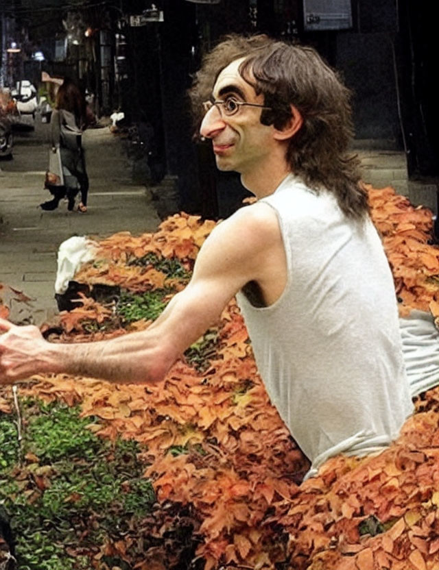 Person in Exaggerated Caricature Mask Sitting Among Autumn Leaves