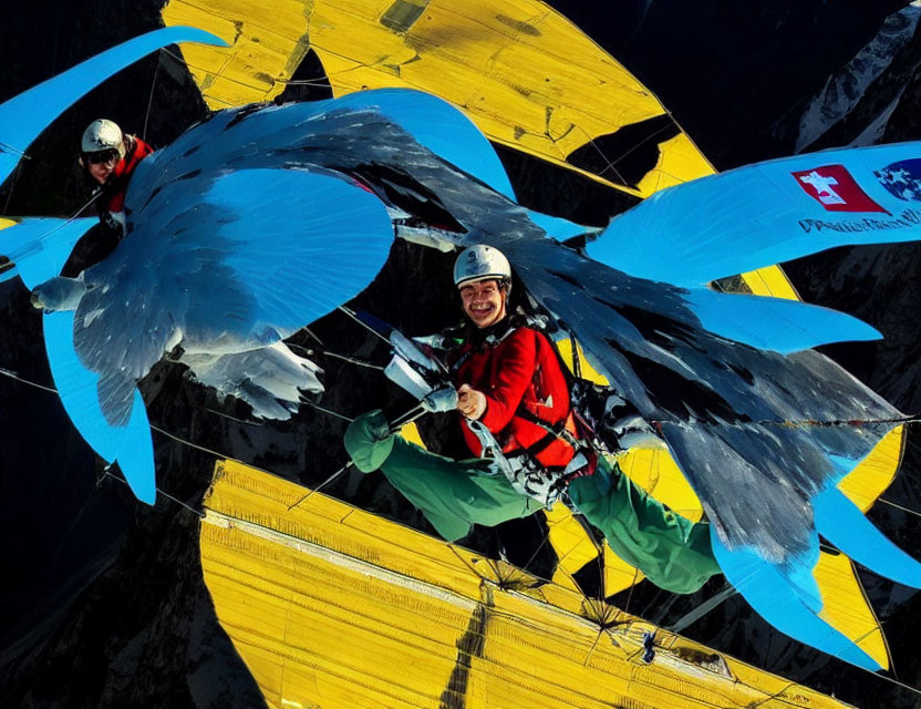 Person in Climbing Gear Smiling on Wall with Wings Graphic