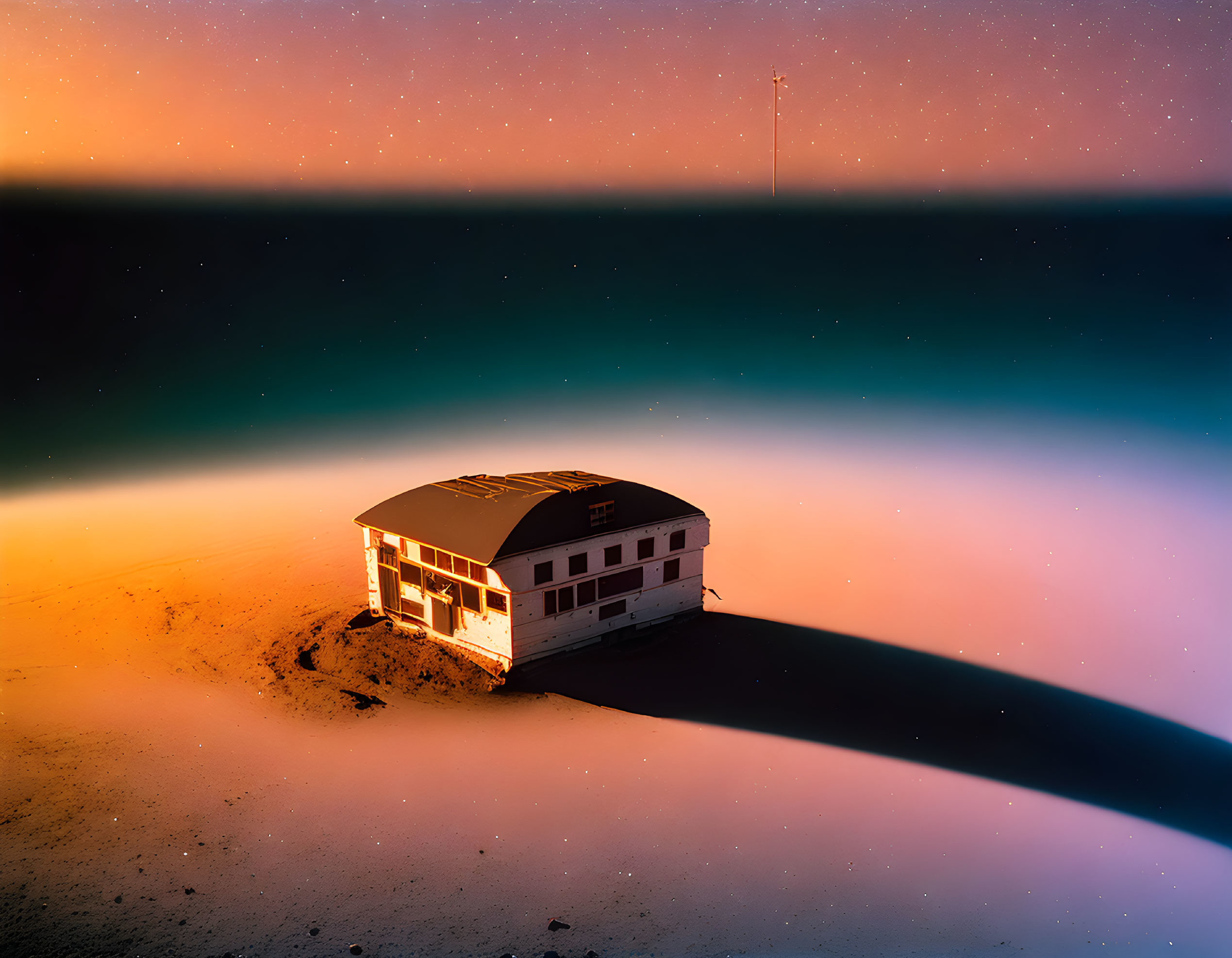 Twilight scene: solitary house, colorful sky, shadow on sand