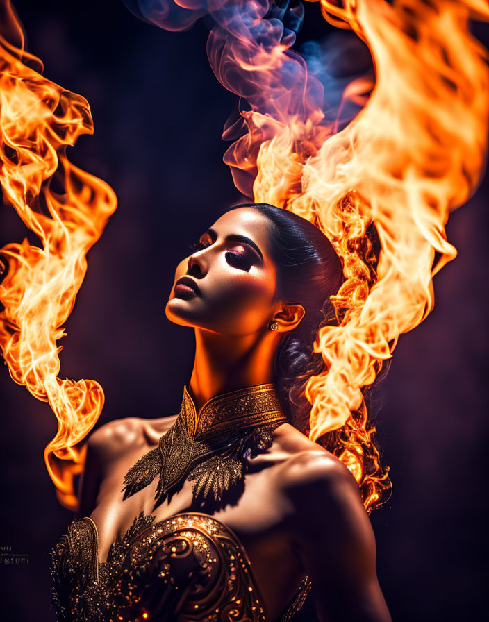 Dark-haired woman amid orange flames and blue smoke, adorned in gold and dark attire