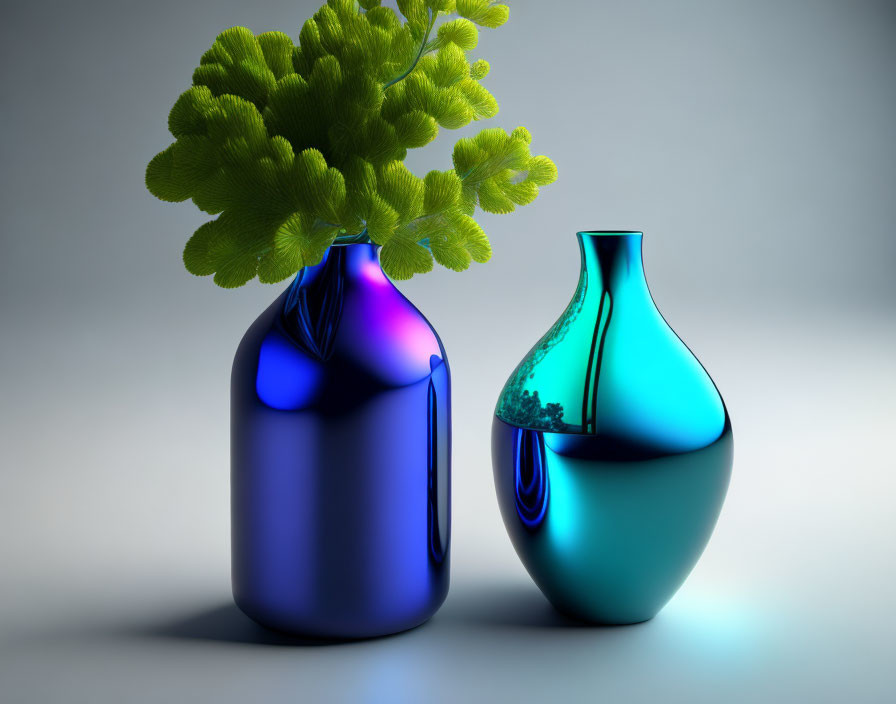 Two glossy vases: one blue with green leaves, the other teal on gray.