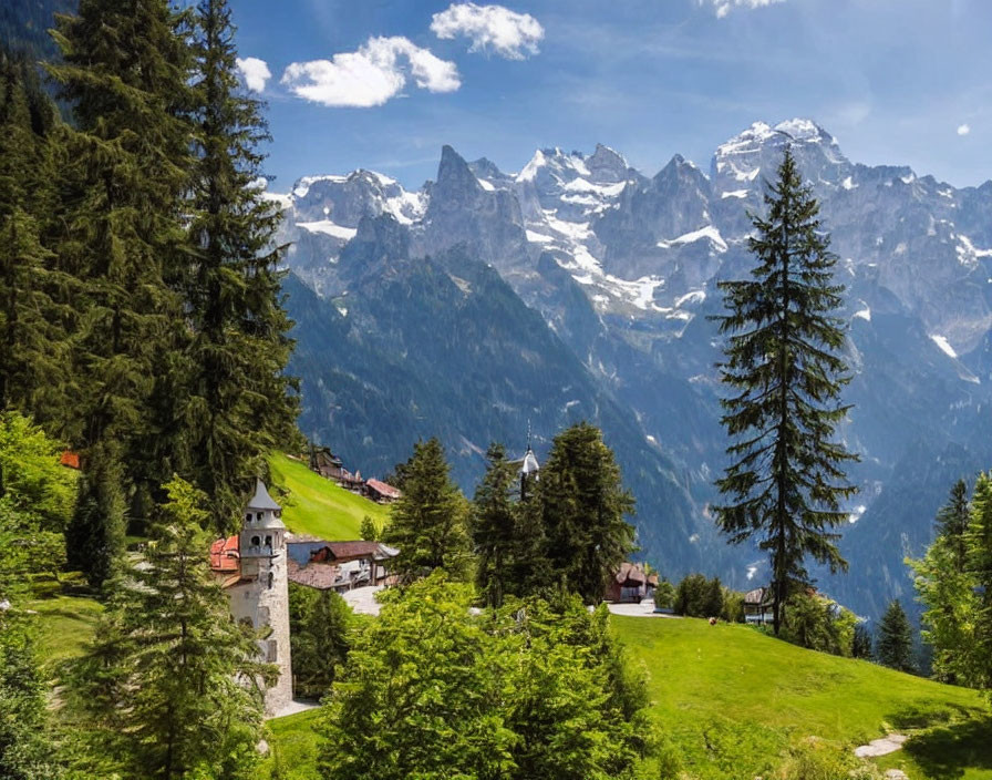 Mountain Range Overlooking Green Valley with Village and Church Spire