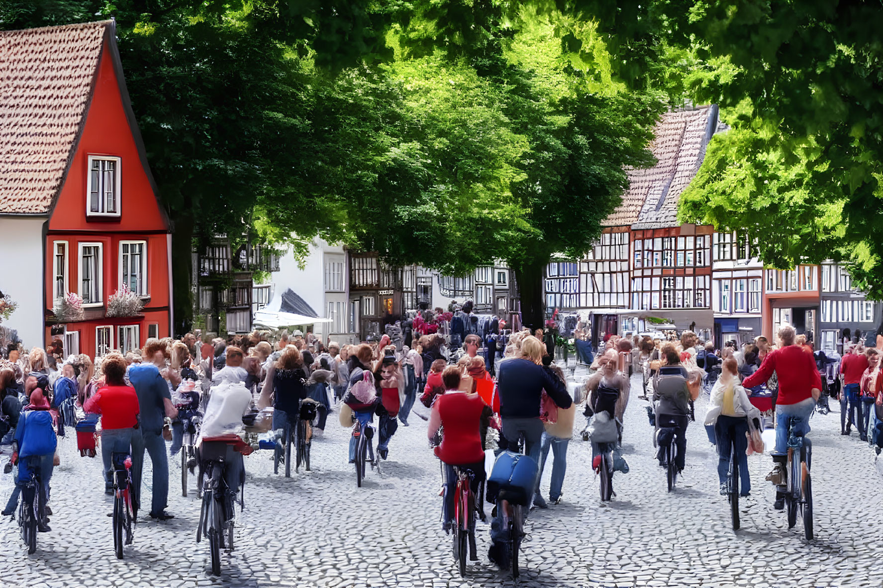 Crowded street with people on bicycles and half-timbered houses