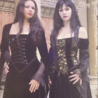 Two Women in Victorian Gothic Fashion with Purple Hair