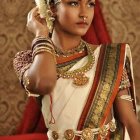 Elegant Woman in Intricate Outfit with Jeweled Headpiece