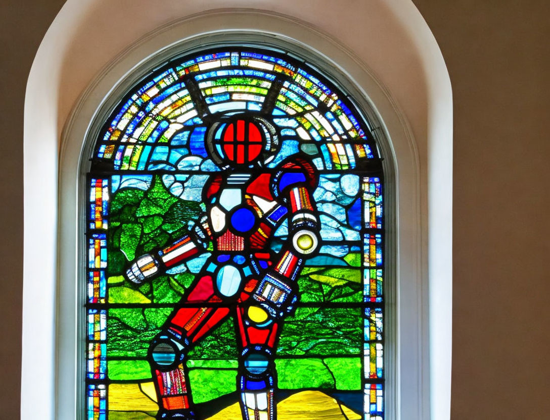 Vibrant astronaut stained glass window with starscape and landscape.