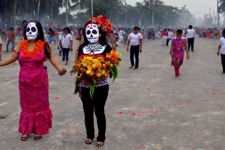 Skull-faced individuals with floral adornments in Day of the Dead celebration