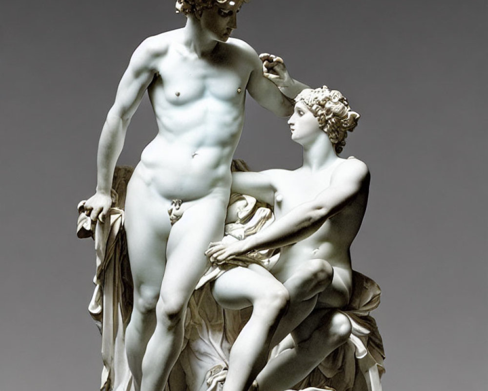 Marble statue of two classical figures in gentle interaction