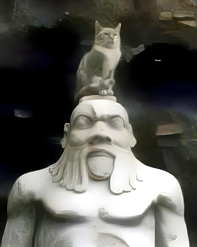 Cat on idol of god Bes