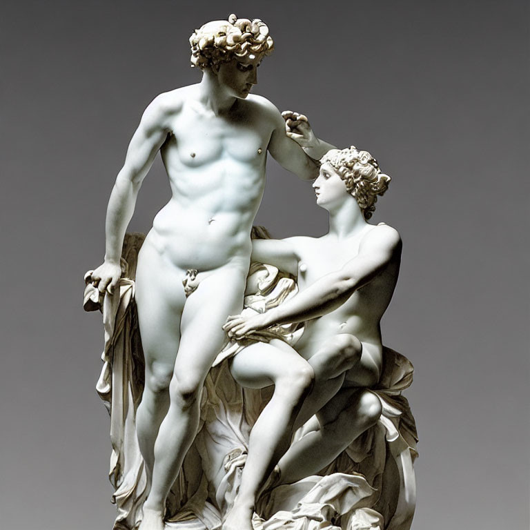 Marble statue of two classical figures in gentle interaction