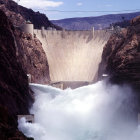 Scenic waterfall in deep canyon with red cliffs